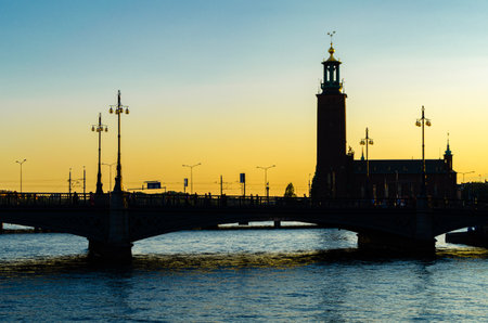 Silhouette of buildings on the waterfront at dusk in Stockholm, Sweden