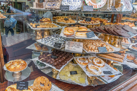 MADRID, SPAIN - NOVEMBER 10, 2022: Showcase of the famous Casa Mira pastry shop in Madrid, Spain. It is known for its turron (nougat), is the first artisanal turron shop in Madrid. They also offer sweets, marzipan, polvorones, and candied fruitのeditorial素材