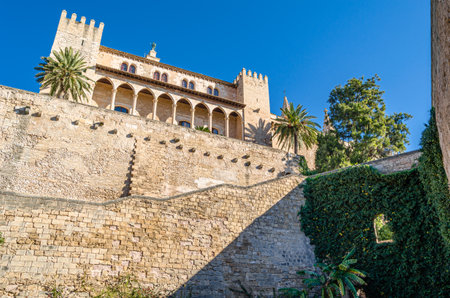 PALMA, SPAIN - JANUARY 11, 2015: The Royal Palace of La Almudaina is the royal palace or royal fortress of Palma, Mallorca, Balearic Islands, Spain. It is one of the official residences of the Spanish royal familyのeditorial素材