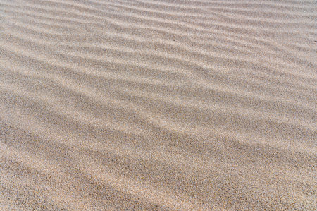 Detail of the pattern in the sand of a beachの写真素材