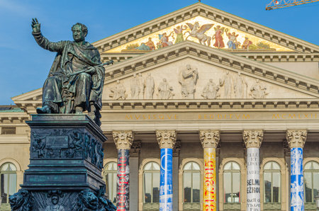 MUNCHEN, GERMANY - JULY 3, 2015: The Max Joseph Monument created in 1826-1835 by Christian Daniel Rauch, in front of The National Theatre, on Max-Joseph-Platz in Munich, Germanyのeditorial素材