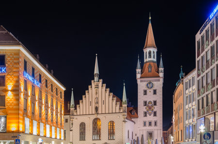 MUNCHEN, GERMANY - JULY 4, 2015: Night view of the Old Town Hall, a medieval building in Munich, Bavaria, Germany. Since 1983, it has housed the Spielzeugmuseum (Toy Museum)のeditorial素材