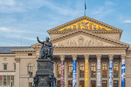 MUNCHEN, GERMANY - JULY 4, 2015: The Max Joseph Monument created in 1826-1835 by Christian Daniel Rauch, in front of The National Theatre, on Max-Joseph-Platz in Munich, Germanyのeditorial素材