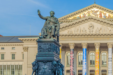 MUNCHEN, GERMANY - JULY 3, 2015: The Max Joseph Monument created in 1826-1835 by Christian Daniel Rauch, in front of The National Theatre, on Max-Joseph-Platz in Munich, Germanyのeditorial素材