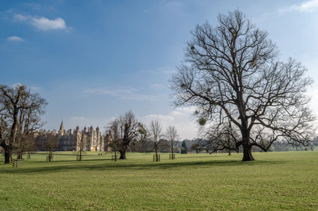 STAMFORD, UNITED KINGDOM - MARCH 20, 2015: View from the park of Burghley House, a 16th-century English country house near Stamford, UK. It is a leading example of the Elizabethan prodigy house. The house is now run by the Burghley House Preservation Trusのeditorial素材