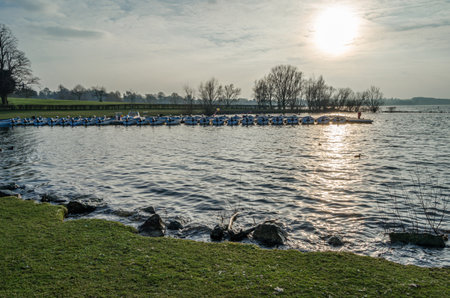 NORMANTON, UNITED KINGDOM - MARCH 20, 2015: Small wooden boats on Rutland Water, a reservoir in Rutland, England, UKのeditorial素材