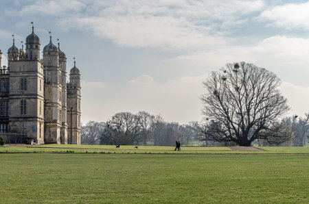 STAMFORD, UNITED KINGDOM - MARCH 20, 2015: Burghley House, a 16th-century English country house near Stamford, UK. It is a leading example of the Elizabethan prodigy house. The house is now run by the Burghley House Preservation Trust, which is controlledのeditorial素材