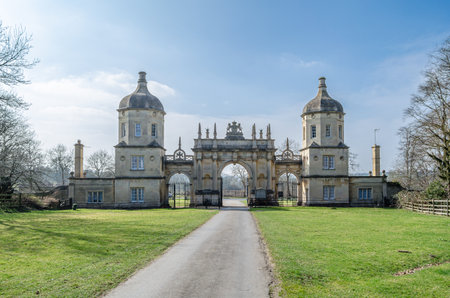 STAMFORD, UNITED KINGDOM - MARCH 20, 2015: Entrance gate to the park where Burghley House is located, a sixteenth-century English country house near Stamford, Lincolnshireのeditorial素材