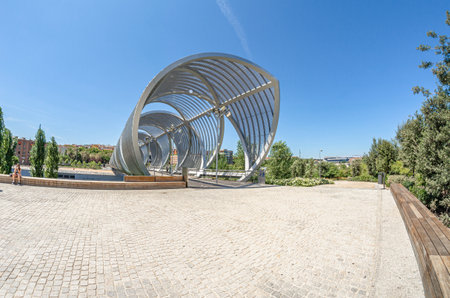 MADRID, SPAIN - AUGUST 23, 2015: The monumental Arganzuela Bridge in Madrid, Spain, spans the Manzanares River and Madrid RÃ­o Park, designed by architect Dominique Perrault inaugurated in 2011のeditorial素材