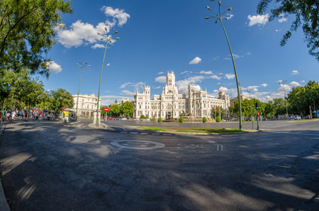 MADRID, SPAIN - AUGUST 16, 2015: View of Plaza de Cibeles (Cibeles Square) in central Madrid, Spain, with the iconic Palacio de Cibeles (Cybele Palace); fisheye perspectiveのeditorial素材