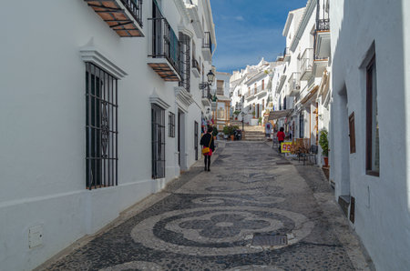 FRIGILIANA, SPAIN - JANUARY 28, 2020: Streets in Frigiliana, typical Andalusian village with white houses, Malaga province, southern Spainのeditorial素材