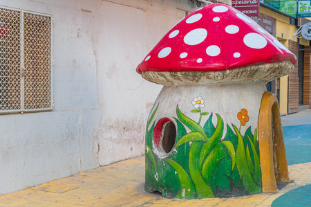 ALICANTE, SPAIN - JANUARY 18, 2023: "Mushroom Street" in Alicante, Spain, pedestrian street transformed in 2013 with oversized colorful mushroom sculptures to revitalize the area and boost businessesのeditorial素材