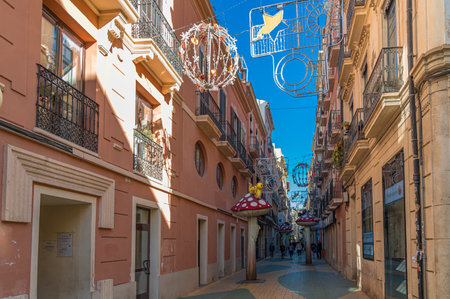 ALICANTE, SPAIN - JANUARY 18, 2023: "Mushroom Street" in Alicante, Spain, pedestrian street transformed in 2013 with oversized colorful mushroom sculptures to revitalize the area and boost businessesのeditorial素材