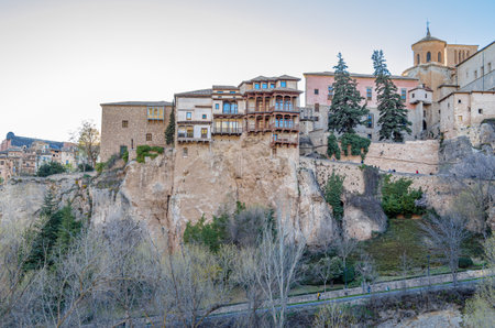 CUENCA, SPAIN - MARCH 28, 2015: The Hanging Houses (Spanish: Casas Colgadas) in Cuenca, Spain. They are so named because part of them has a corbelled roof, or large balconies, jutting out from the high rocky ledge of the Huecar River gorge. The only threeのeditorial素材
