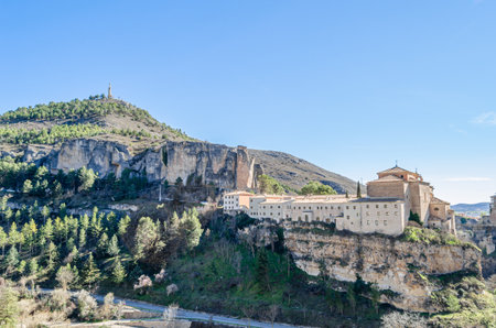 CUENCA, SPAIN - MARCH 28, 2015: Panoramic view of the Huecar Gorge with the town of Cuenca, Spain. In the foreground, the former Convent of San Pablo, since 1993 it houses a state-owned Parador hotelのeditorial素材