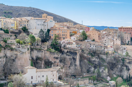 View of the Jucar Gorge and the town of Cuenca, Spain, a natural phenomenon caused by the erosion of the waters of this river on the limestone rock on which the city is built and which surrounds itの写真素材