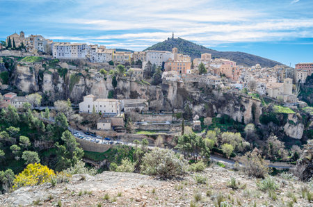 View of the Jucar Gorge and the town of Cuenca, Spain, a natural phenomenon caused by the erosion of the waters of this river on the limestone rock on which the city is built and which surrounds itの写真素材