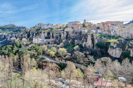 View of the Jucar Gorge and the town of Cuenca, Spain, a natural phenomenon caused by the erosion of the waters of this river on the limestone rock on which the city is built and which surrounds itの写真素材