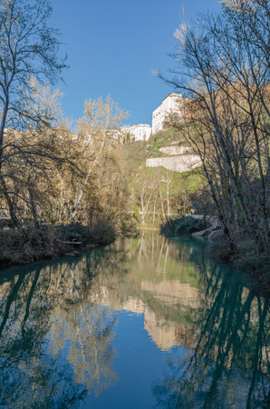 View of the town of Cuenca, Castilla la Mancha, Spain, from the banks of the Jucar Riverの写真素材