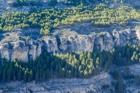Landscape in the Huecar Gorge, near the town of Cuenca, Spain, a natural phenomenon caused by the erosion of the waters of this river on the limestone rockの写真素材