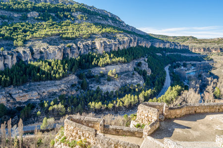 Landscape in the Huecar Gorge, near the town of Cuenca, Spain, a natural phenomenon caused by the erosion of the waters of this river on the limestone rockの写真素材