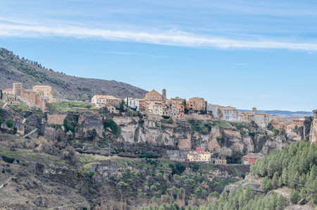 View of the Jucar Gorge and the town of Cuenca, Spain, a natural phenomenon caused by the erosion of the waters of this river on the limestone rock on which the city is built and which surrounds itの写真素材