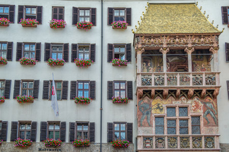 INNSBRUCK, AUSTRIA - JULY 11, 2015: The Goldenes Dachl (Golden Roof), landmark in Innsbruck, Austria. Completed in 1500, in houses the International Alpine Convention's Office, a museum (the Maximilianum) and the Innsbruck City Archivesのeditorial素材