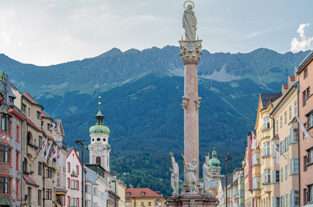 INNSBRUCK, AUSTRIA - JULY 11, 2015: View of the Altstadt (Old Town) of Innsbruck, Austria, with St. Anne's Column (Annasaule) in the foregroundのeditorial素材
