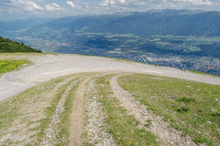 View of the city of Innsbruck, Austria from Seegrube station on Nordkette, the southernmost mountain chain of the Karwendel in the Austrian Alpsの写真素材