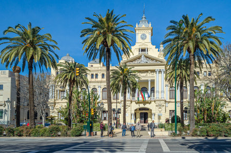 MALAGA, SPAIN - JANUARY 27, 2020: View of the Paseo del Parque in Malaga, Spain, with the Malaga City Hall (also known as the Casona del Parque), a 20th-century neo-Baroque buildingのeditorial素材