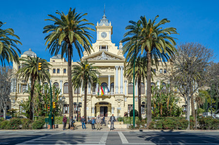 MALAGA, SPAIN - JANUARY 27, 2020: View of the Paseo del Parque in Malaga, Spain, with the Malaga City Hall (also known as the Casona del Parque), a 20th-century neo-Baroque buildingのeditorial素材
