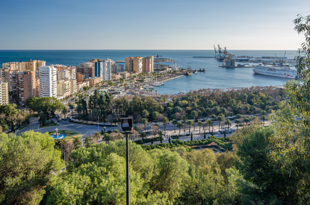 MALAGA, SPAIN - JANUARY 26, 2020: Aerial view of Malaga, Spain, from Mount Gibralfaro. View of Muelle Uno, an open-air shopping center and pier located in the port of Malagaのeditorial素材