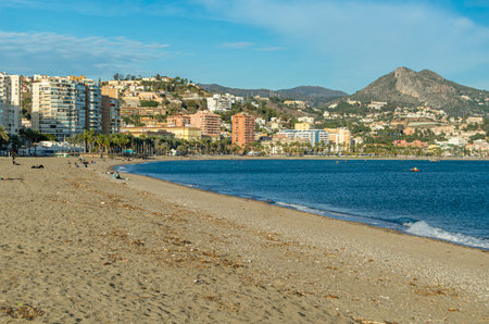 MALAGA, SPAIN - JANUARY 28, 2020: View of La Malagueta beach, a very popular urban beach in the center of Malaga, Spainのeditorial素材