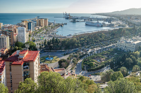 MALAGA, SPAIN - JANUARY 26, 2020: Aerial view of Malaga, Spain, from Mount Gibralfaro. View of Muelle Uno, an open-air shopping center and pier located in the port of Malagaのeditorial素材
