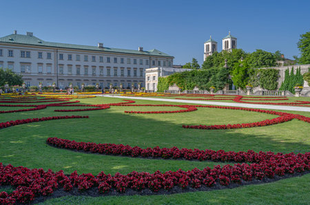 SALZBURG, AUSTRIA - JULY 5, 2015: People strolling through the Mirabell Palace and Mirabell Gardens...