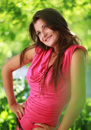 Pretty young happy woman posingの写真素材