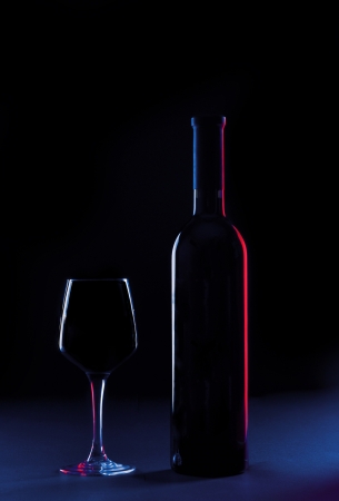 Wine glass and bottle silluetteの写真素材