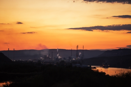 Industrial chimneys, sunset shotの写真素材