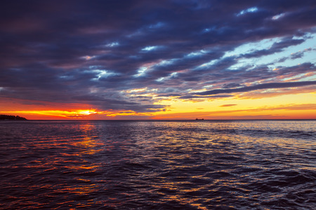 Beautiful cloudscape over the sea, sunrise shotの写真素材