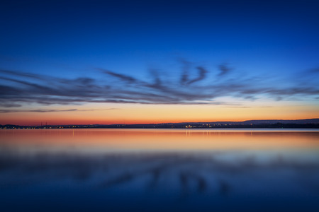 Beautiful cloudscape over the sea, sunset shotの写真素材