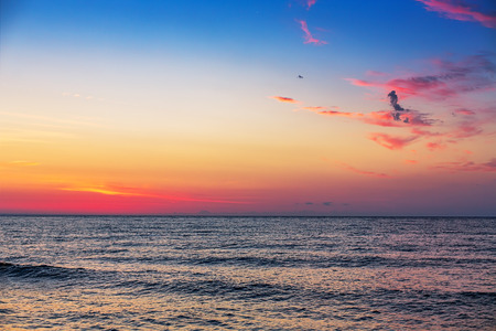 Beautiful cloudscape over the sea, sunrise shotの写真素材