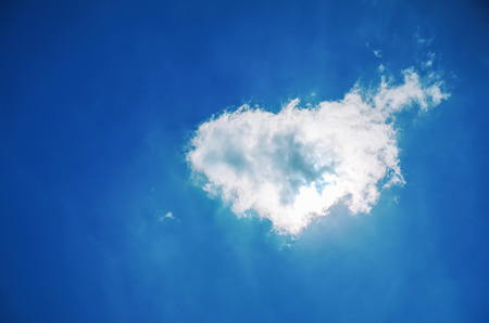 Heart shaped cloud in the blue skyの写真素材