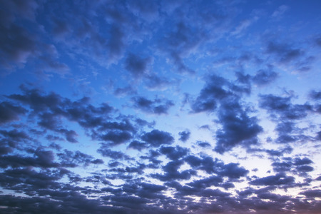 Sunset of small clouds in the blue skyの写真素材