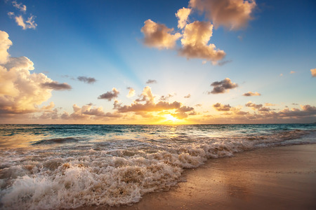 Sunrise on the beach of Caribbean sea, Dominican Republicの写真素材