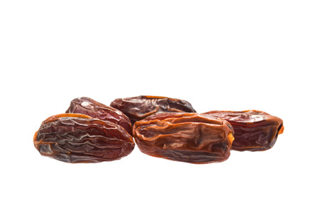 Dried delicious dates isolated on a white background