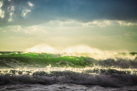 Beautiful green sunrise waveの写真素材