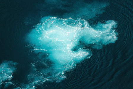 Abstract splash turquoise sea water for backgroundの写真素材