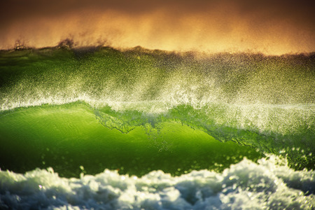 Beautiful green sunrise waveの写真素材