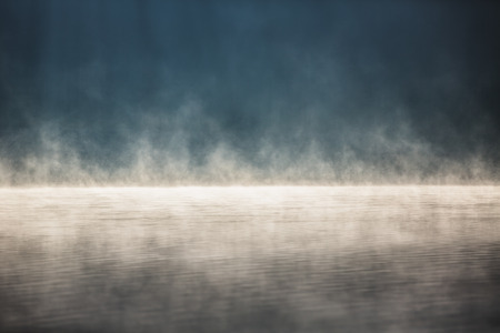 Morning fog on the lake, sunrise shotの写真素材