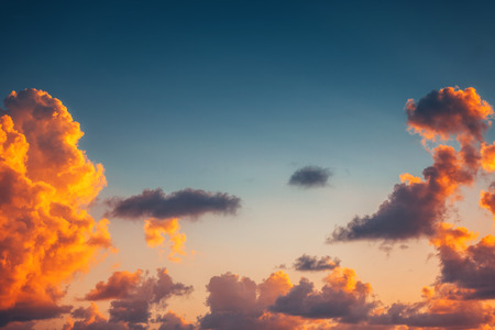 Cloudscape and dramatic orange sky, sunset shotの写真素材